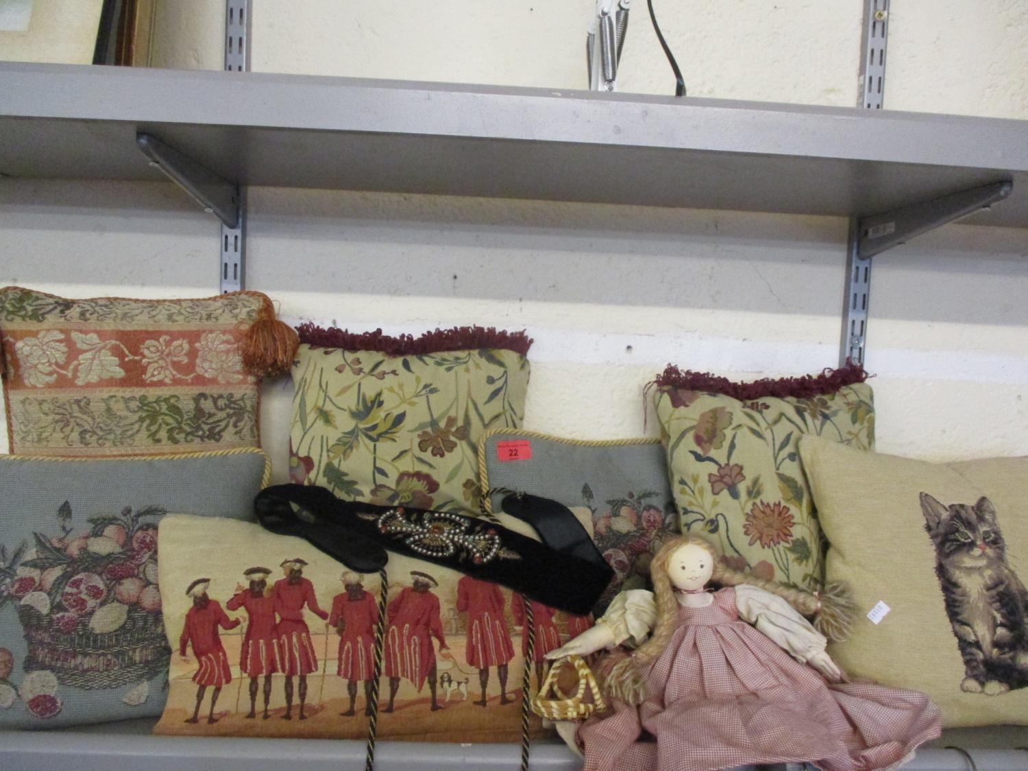 Modern tapestry, needlepoint and similar scatter cushions, together with a cloth doll and an