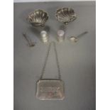 A small quantity of silver items to include a pair of silver salts with spoons, two thimbles and a