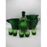 Possibly Edvin Ollers (1888-1959) for Kosta Glass - a dark green glass vase with central