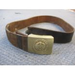 A post war West German 'Unity, Justice and Freedom' leather belt with silver coloured buckle