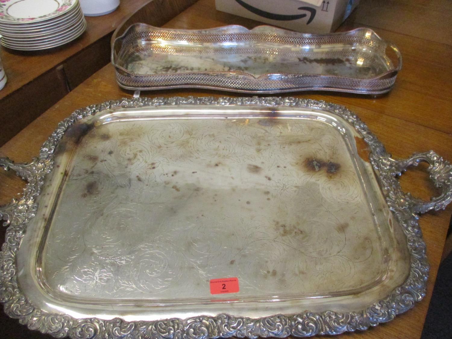 Two silver plated trays to include a large example with twin handles. Location:RAB