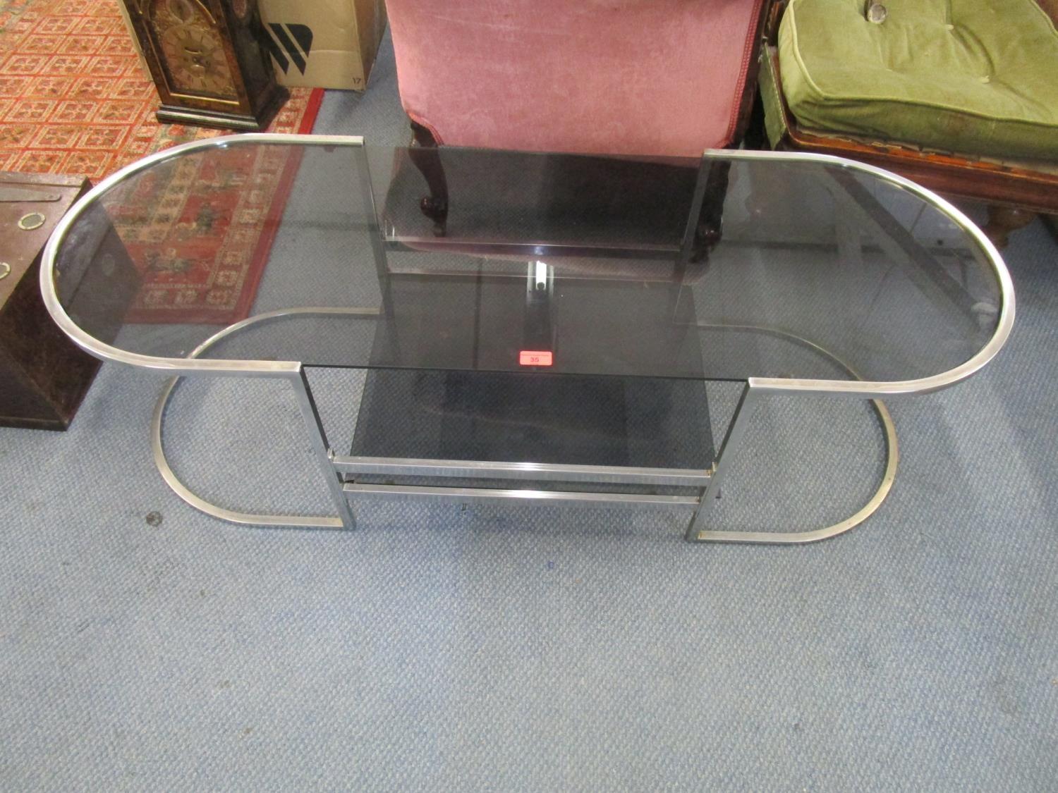 Circa 1970 metal and smoked glass two tier coffee table 15 6/8" x 51 7/8" x 18 7/8"