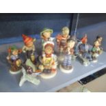 A selection of Hummel figures, together with three Beswick bird ornaments
