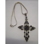 A 925 silver pendant cross set with amethyst coloured stones on a 925 silver necklace
