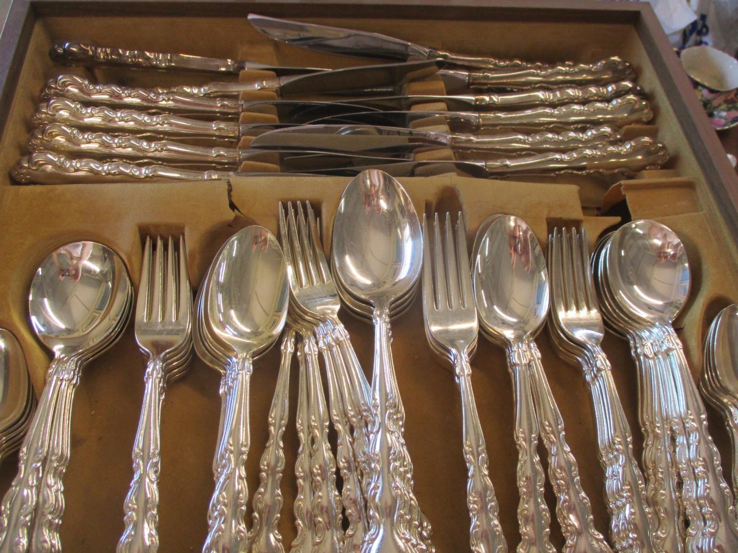 A canteen of Oneida Community silver plated cutlery, 12 place setting and additional pieces.