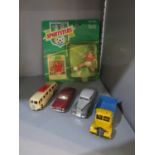 A group of four mid 20th century Dinky and Corgi diecast vehicles to include a Corgi Jaguar Mark X