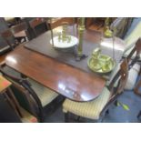 A 19th century mahogany dining table having two extra leaves 27" H x 90 1/2" W extended, together
