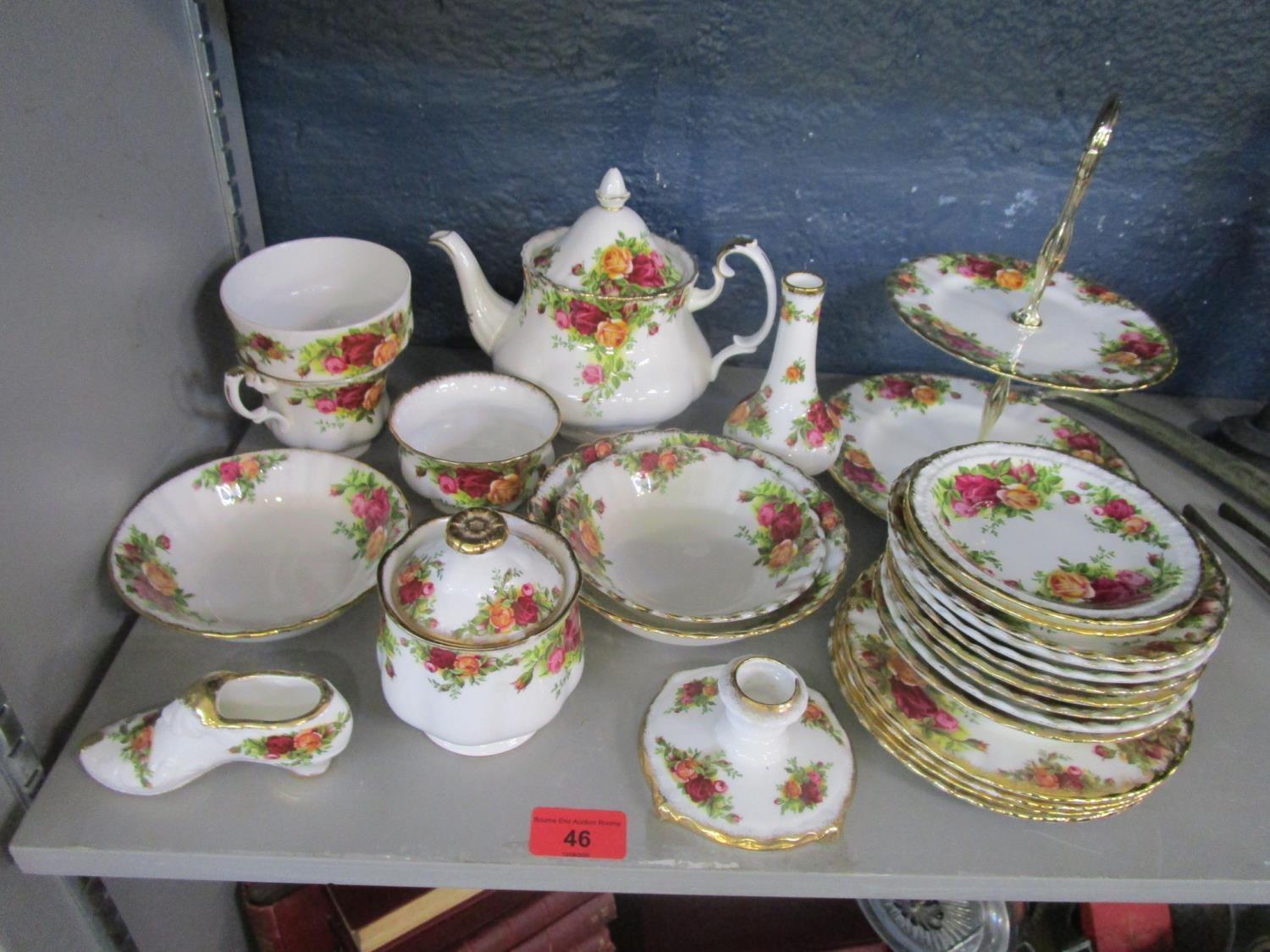 A Royal Albert Country Roses part teaset to include a cake stand
