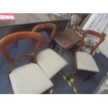 A set of four walnut framed bar back dining chairs and a 1930's oak drop leaf table