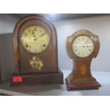 Two early 20th century mantle clocks, to include a American oak cased eight day clock and an