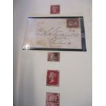 A Stamp album containing Penny Reds, 1912-1975, King George V, King Edward VIII, King George VI