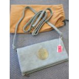 Mulberry - a foldover leather bag with detachable handbag and shoulder straps in pale teal green