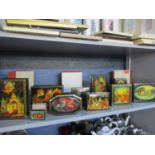 A collection of late 20th Century Russian black lacquered and painted boxes, ten in total