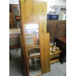 A contemporary pine single wardrobe, with matching dressing table having four drawers and an