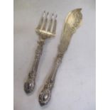 A Victorian silver fish serving knife and fork