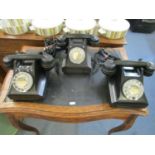 A vintage black cased GPO dial telephone extension system, with GPO 332L telephone rotary phone with