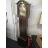 A reproduction mahogany cased granddaughter clock having an arched top dial inscribed Tempus