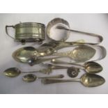 Silver to include flatware, spoons, condiments, napkin ring, sugar tongs