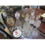 Glassware to include four decanters, a tall jug, a late 19th century vase A/F and other items