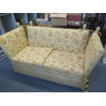 A beige and floral upholstered Knoll drop end sofa