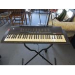 A late 20th century Yamaha keyboard and stand and two other keyboards Location: LAF