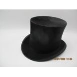 A Henry Heath top hat, 6 1/2" side to side, 8" front to back, approximate internal circumference