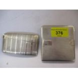 A silver engine turned card case and a silver cigarette case