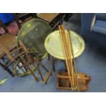 A miscellaneous lot to include a brass tray topped wooden folding table, five wooden walking sticks,