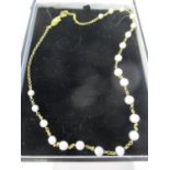 A 9ct gold and pearl necklace