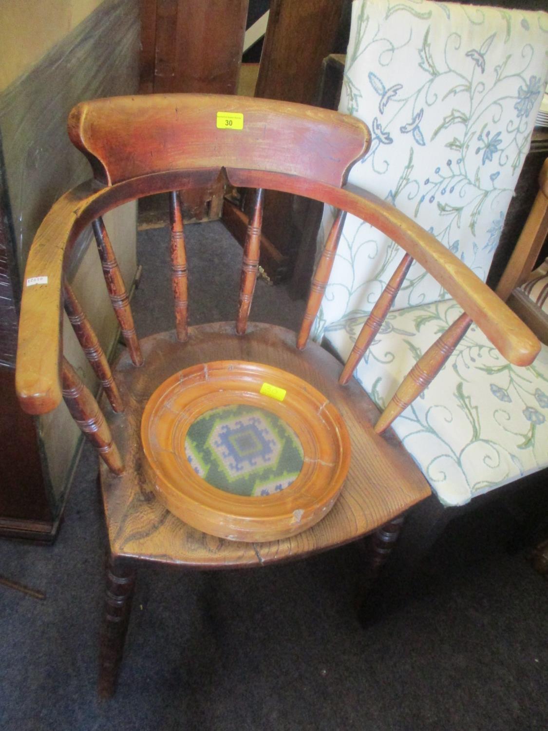 A 19th century elm seated desk armchair having turned supports, together with a tapestry in a pine