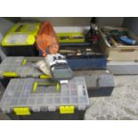A box of miscellaneous paintbrushes and garage related tools, tool boxes, an extension cable and