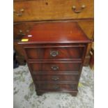 A reproduction mahogany cabinet with hinged lid containing a Denon CD received and a selection of