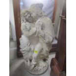 A composition stone garden statue of two figures, 29" h