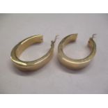 A pair of 9ct gold earrings