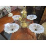 An early 20th century French brass four branch chandelier with opaque glass shades