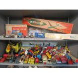 A mixed lot of diecast model vehicles to include a Batmobile, a boxed Comet Douglas A26 Invader