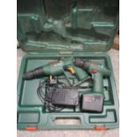 A boxed Bosch PSB 12VSP-2 drill and a Bosch PSK 120 with charger and box