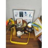 A mixed lot of Guinness memorabilia to include a bucket, wooden toucans, framed pictures and other
