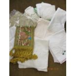 A quantity of vintage table linen and lace, together with a late 20th century needlepoint and