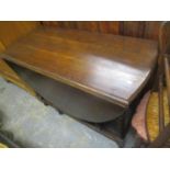 A 1930s oak barley twist drop leaf table 29"h x 41"w