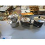 A selection of cookware pots and pans to include a Prestige pressure cooker