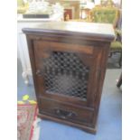 A Malaysian cabinet, cupboard and single drawer below on ogee bracket feet 35"h x 23 1/2"w