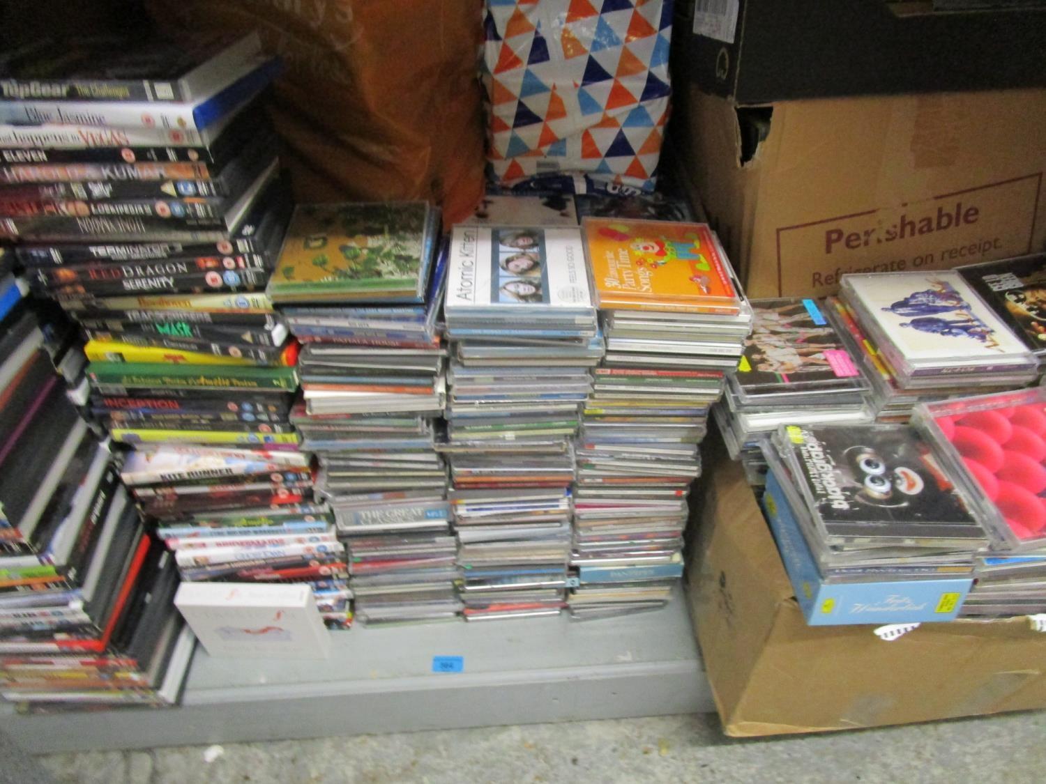 1300 DVDs, CDs, cassettes and two CD stands - Image 2 of 2