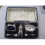 An early 20th century set of silver condiments in a Harrods box