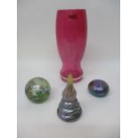 A selection of studio glass to include a Helene Millard pink glass vase on a clear glass foot,