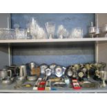 A selection of motorcycle silver and silver plated trophy cups, trophy plaques, enamel spoons and