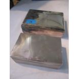 An early 20th century silver machine turned cigarette box and a silver plated cigarette box