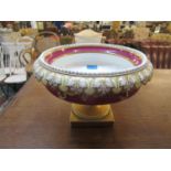 A 19th century English porcelain footed centrepiece bowl decorated to the interior with a country