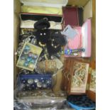 A mixed lot of costume jewellery to include beaded necklaces, earrings, watches and other items