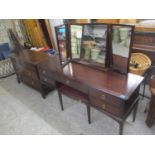 A Stag Minstrel five drawer dressing table and a matching chest of six drawers